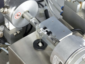 Dia-Stron FTT950 torsion tester, with a mounted single hair fibre sample in the pockets prior to the torsion measurement
