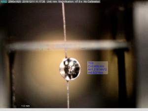 Camera image from the IFSS Visualisation software, showing the image of the resin droplet and measurements overlaid