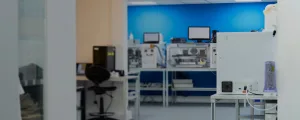 a modern hair and fibre testing laboratory with various computers and equipment