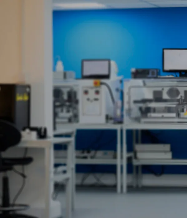 a modern hair and fibre testing laboratory with various computers and equipment